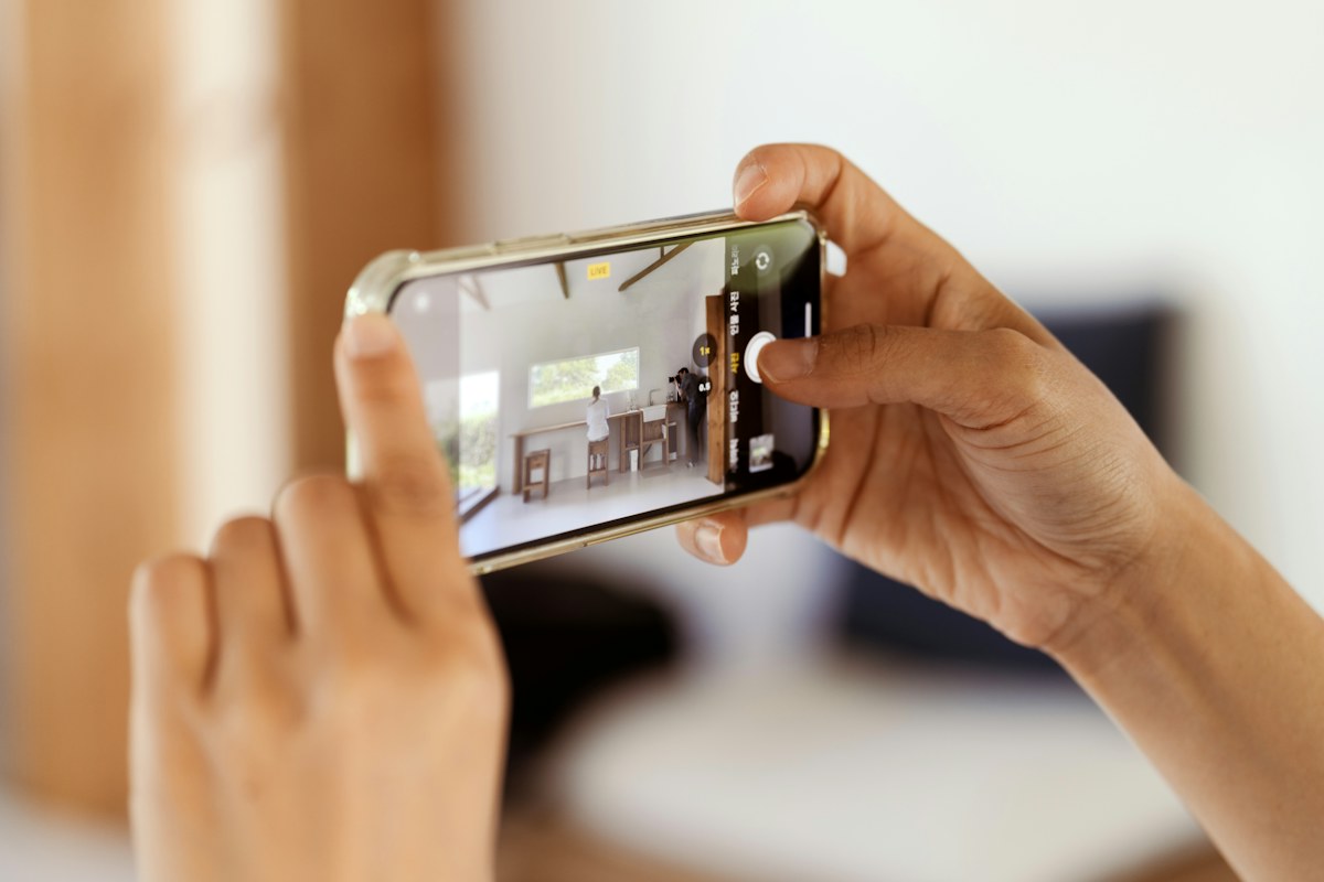 A person taking a photo with a phone in Jeju